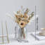 Décoration de vase et fleur simulée