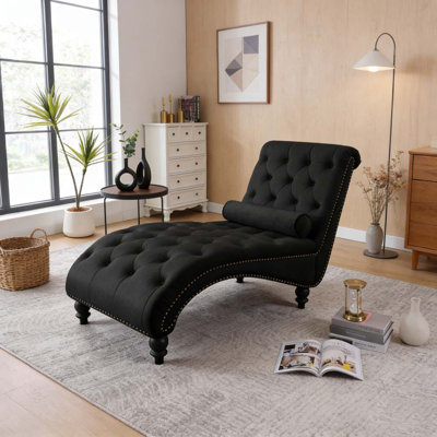 Fauteuil inclinable en velours capitonné
