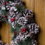 Christmas Hanging Wreath- Festive Pine Cone Display with Subtle White Frosting-1049371927