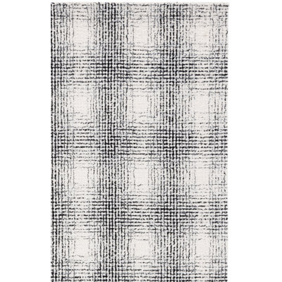 Tapis ivoire / noir Ebony 809