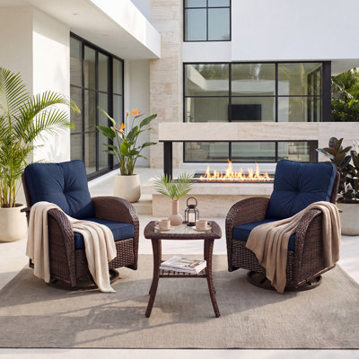 Ensemble de 3 fauteuils à bascule pivotants en résine tressée avec table d'appoint et coussin bleu marine, ensemble de conversation moderne pour véranda, terrasse, balcon et jardin