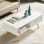 Table basse rectangulaire avec pieds en bois massif