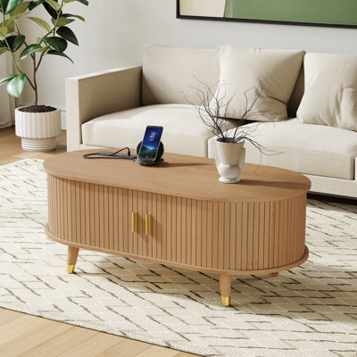 Table basse ovale cannelée avec station de charge