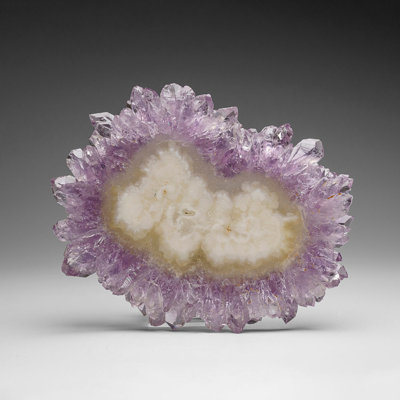 Améthyste, tranche de stalactite d'Uruganda (181,1 grammes)