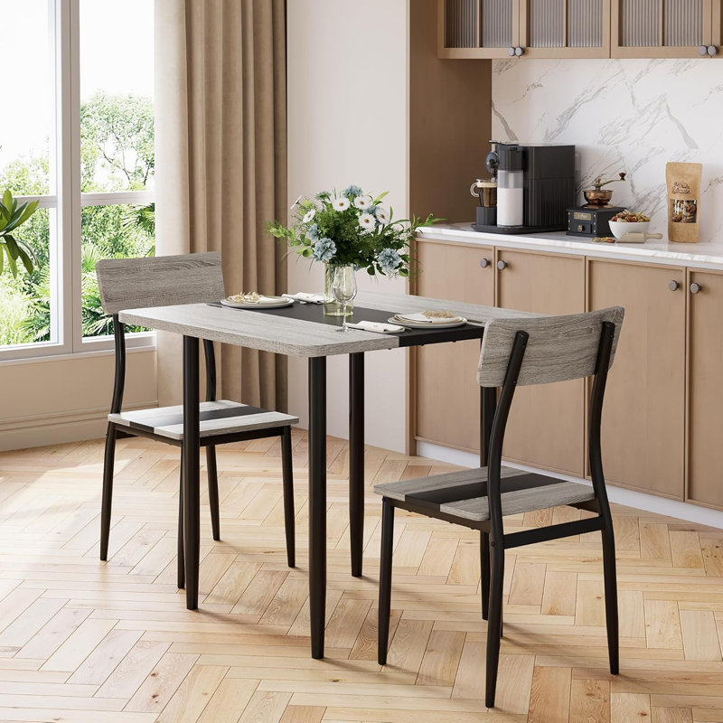 Ensemble table et chaises de salle à manger 3 pièces pour 2 personnes, structure en métal et plateau en MDF, plateau bicolore gris et noir.