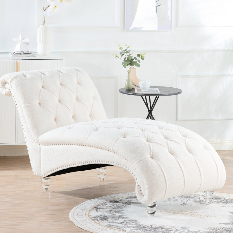 Chaise longue sans accoudoirs avec une grande assise stable, un rembourrage en éponge haute et un rendement de rebond élevé, un savoir-faire emboutissant, des clous à bulles décorées, trois choix de tissus - velours, velours PU, charge