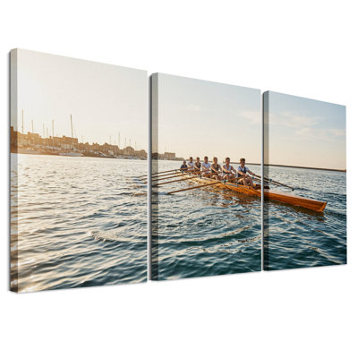 Ensemble de 3 toiles murales représentant une équipe d'aviron en barque en bois au coucher du soleil