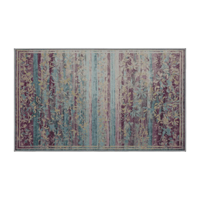 Tapis gris soyeux et moelleux