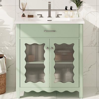 Meuble-lavabo de 79 cm avec lavabo rectangulaire en céramique, grand espace de rangement, rayures verticales et poignées argentées pour une salle de bain lumineuse et aérée. Verre trempé, portes à fermeture amortie, faux tiroir, rayures. Style moderne et élégant.