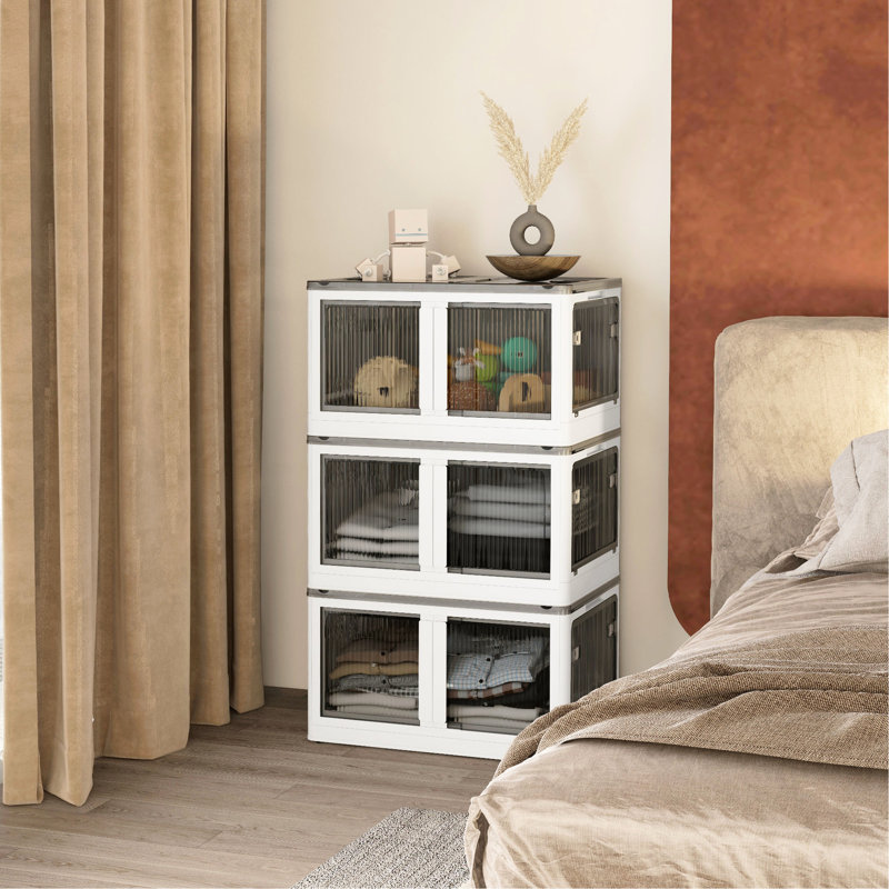32 bacs de rangement empilables avec couvercles. 3 rangements pliables. Roues en plastique. Rangez votre espace. 5 accès. Pliant. Empilage sécurisé. Blanc. Capacité: Couvercles de 110 lb, boîtes de tiroir. Store