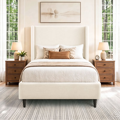Ana Upholstered Wingback Bed