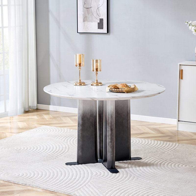 Table de salle à manger ronde en MDF à motif de marbre blanc avec des pieds dégradés uniques, une conception compacte pour les petits espaces et l'esthétique moderne