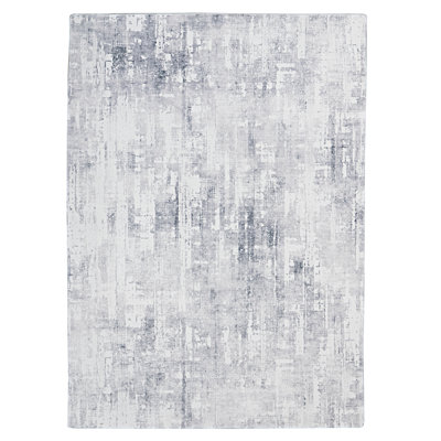 Antaniyah Faux Rabbit Fur Hand Tufted Rug