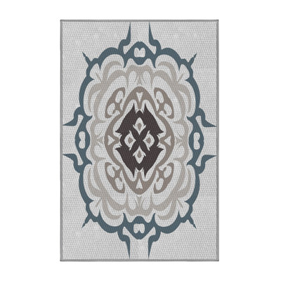 Tapis damassé bleu