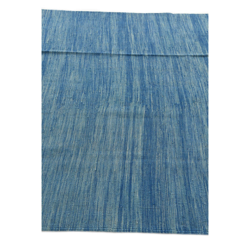 Tapis bleu Paquette