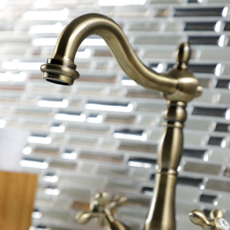 Robinet pour vasque à fixation sur comptoir à deux ou trois trous Kingston Brass Heritage, Laiton rétro