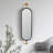Oval Metal Framed Wall Mirror with Brackets, Black and Gold