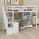 Lit mezzanine avec bureau en L et tiroirs, armoire et escalier de rangement