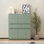 Armoire de rangement spacieuse en bois vert avec 4 portes et 2 tiroirs pour une utilisation polyvalente à la maison