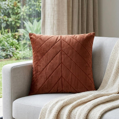 Coussin décoratif en velours matelassé rose