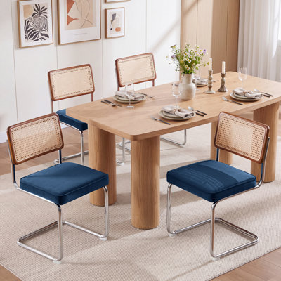 Walton Cantilevered metal dining chairs with rattan back