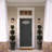 Niyae 11" Classic Outdoor Wall Sconce with Built-in GFCI Outlet 1 Light in Matte Black