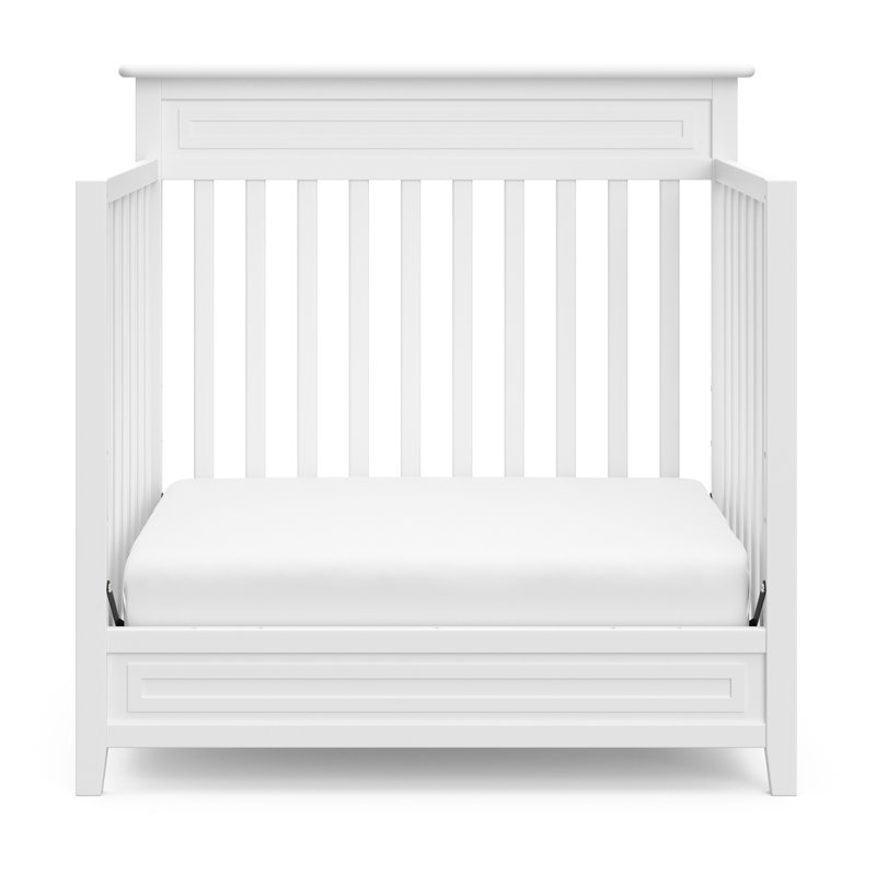 White 4-in-1 Convertible Mini Crib with Mattress