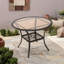 Table en rotin avec plateau en verre trempé