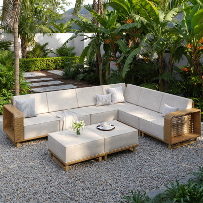 Canapé d'angle modulaire en résine tressée pour 6 personnes, assise profonde de 61 cm, coussins en oléfine de 25 cm d'épaisseur.