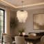Lustre moderne à 5 lumières avec cascade de cristaux et intensité variable