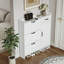 Armoire à chaussures blanche avec 4 portes et 1 tiroir