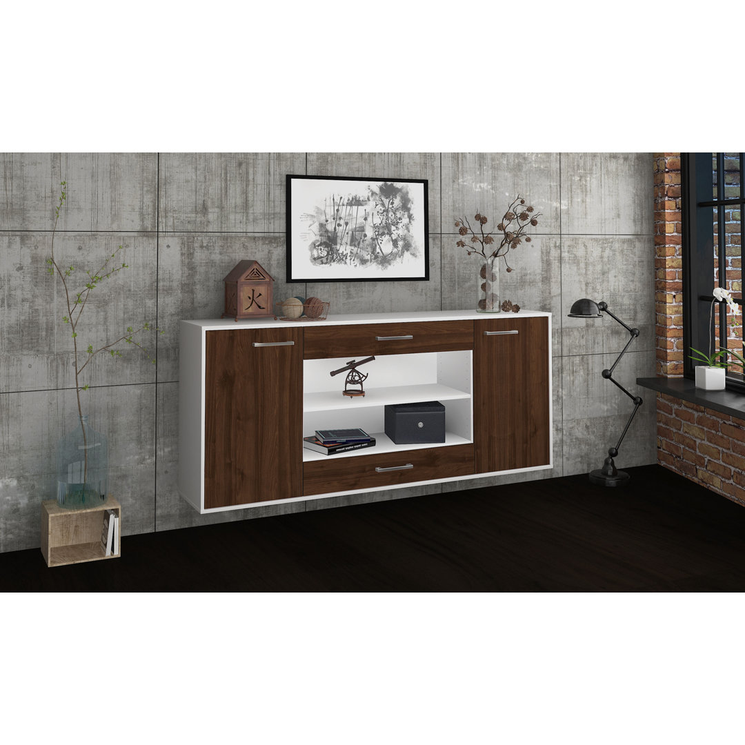 Das Sideboard Mussab hat Metallgriffe. Es hat die Maße 180 cm x 79 cm x 35 cm.