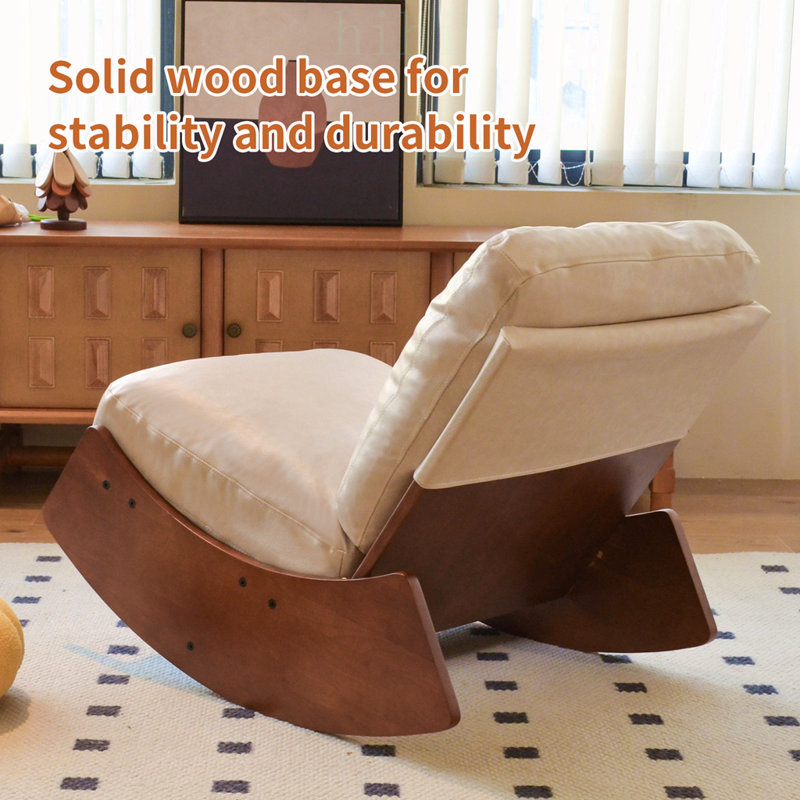Chaise berçante confortable avec revêtement de haute qualité, structure en bois massif, parfaite pour les décors multiples et la détente
