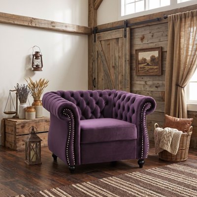 Fauteuil club de style Chesterfield en velours avec pieds en bois de bouleau