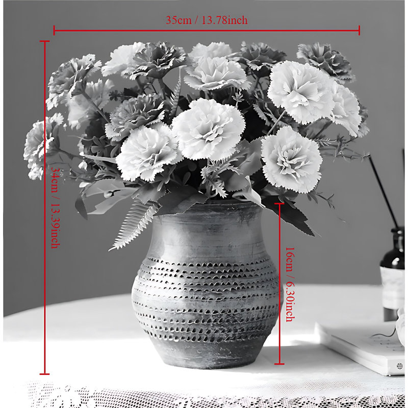 Arrangement d'œillets dans un vase