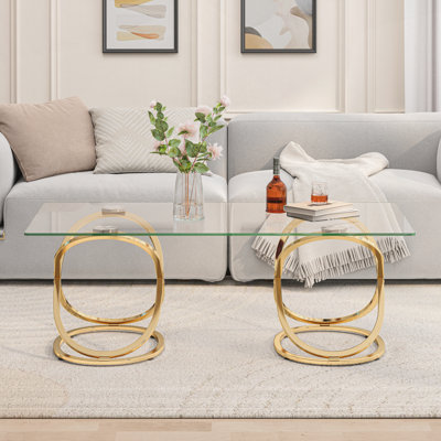 Table basse 31,5 "en verre rectangulaire moderne avec cadres en forme d'anneau, structure en métal et verre trempé transparent, centre de table luxueux pour le salon, la chambre à coucher et le bureau, doré