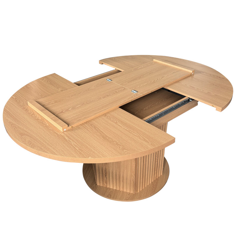 Élégante table de salle à manger ronde, en bois d'hévéa, avec un piètement hexagonal texturé et extensible, idéale pour les réunions de famille. Table ajustable à 6 places, concave et convexe.