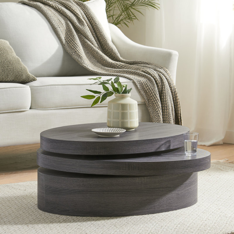Table basse ovale noire mate avec plateau pivotant et fonction de rotation de style moderne nécessitant un assemblage minimal