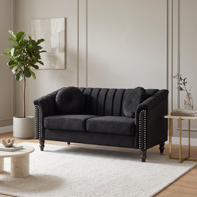 Black Upholstered Sofa with Channel Tufting, Rolled Arms and Nailhead Trim