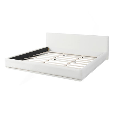 Lit rembourré doux et confortable. Centre de table luxueux et confortable, très grand, blanc