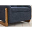Fauteuil en chenille bleu avec rembourrage en mousse et fauteuil latéral en bois bleu, pour la décoration du salon-218876656