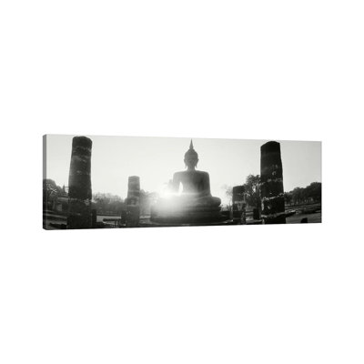 Statue Of Buddha At Sunset, Sukhothai Historical Park, Sukhothai, Thailand #3 by Panoramic Images - Wrapped Canvas Panoramic Print