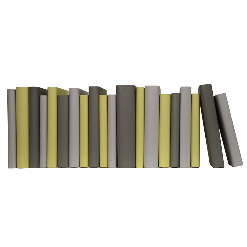 Livres décoratifs - livres sur papier brouillé - livres gris et jaunes au pied