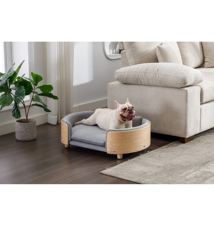 Lit pour chien surélevé de style scandinave avec pattes en bois massif, dossier en bois courbé et coussin en velours