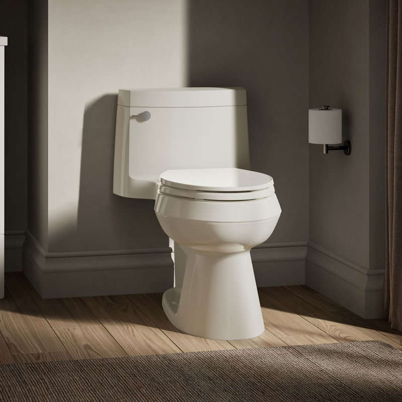 Cimarron® 1.28 GPF Water Efficient Elongated One-Piece toilet (Seat Included), Biscuit, Left-Hand
