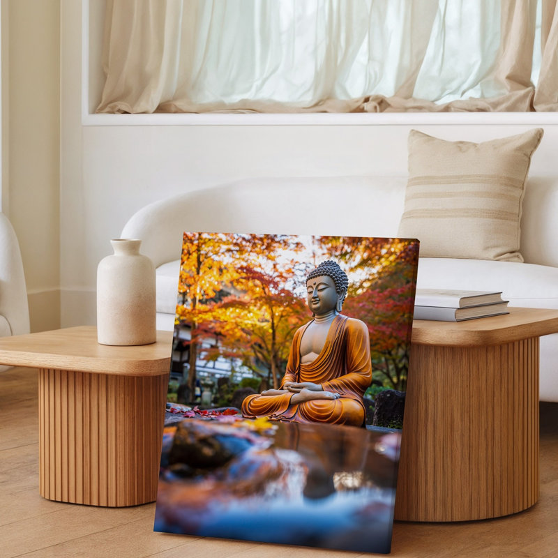 Toile, statue de Bouddha sereine assise dans une pose méditative ornée d'une robe orange fluide avec des plis complexes posés sur une toile