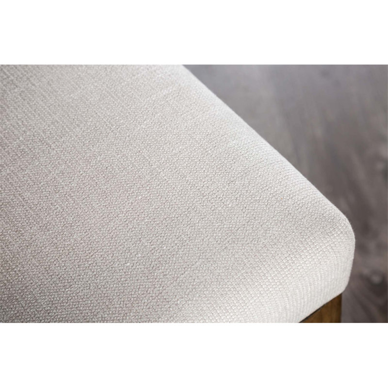Banc de rembourrage moderne avec coussin, base à tréteaux de style rustique et siège rembourré confortable pour une ambiance de maison de campagne confortable.