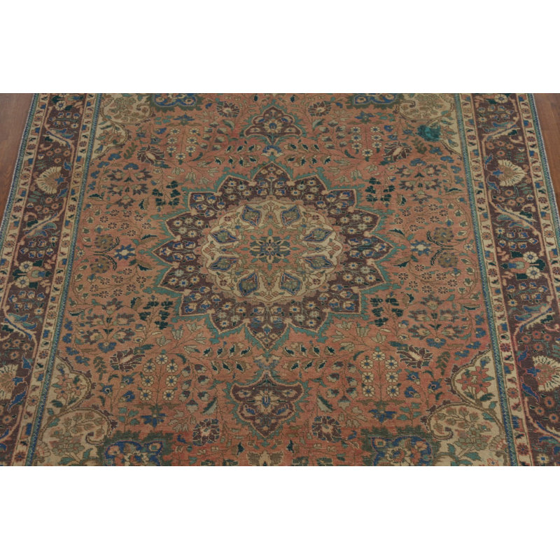 Tapis traditionnel en laine à motif médaillon 7 x 10