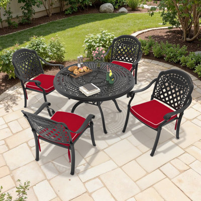 Ensemble de salle à manger de patio rond pour 4 personnes (120 cm) avec trou pour parasol, 4 chaises empilables avec coussins rouges