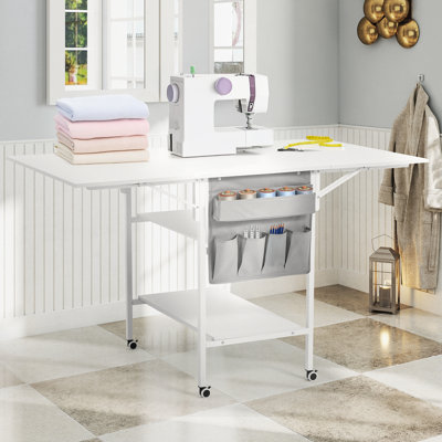  Foldable Craft Table With Storage, Movable Sewing Table With 2 Shelves & Side Pocket, Home Hobby Folding Table For Craft Room, Fixed Height, White